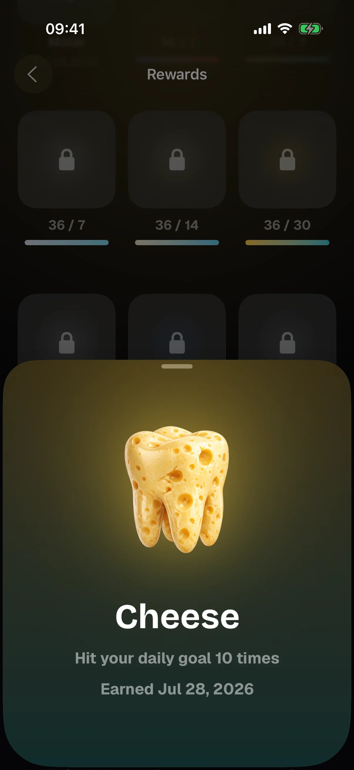 Detail view of the Cheese tooth after unwrapping it, with the condition that earned it
